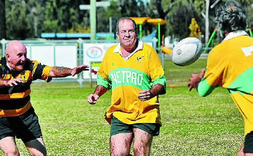 Paul Campbell passes to Alex Harslett at the Golden Oldies Union game on Saturday. Paul Campbell passes to Alex Harslett at the Golden Oldies Union game on Saturday.